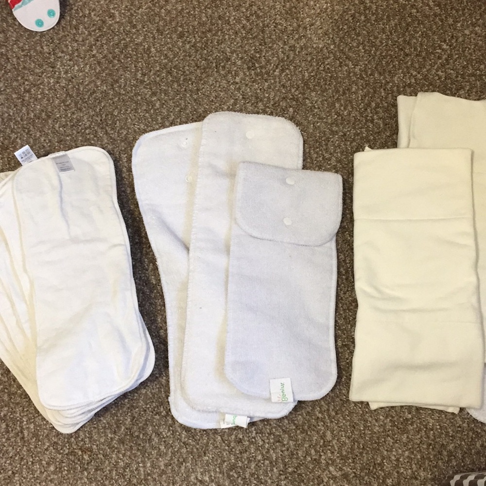 Assortment of cloth diaper inserts: prefolds, hemp